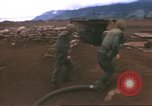 Image of Marines refueling UH-1E Iroquois helicopters Khe Sanh Vietnam, 1968, second 3 stock footage video 65675058028