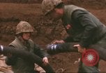 Image of Marines refueling UH-1E Iroquois helicopters Khe Sanh Vietnam, 1968, second 4 stock footage video 65675058028