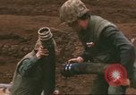 Image of Marines refueling UH-1E Iroquois helicopters Khe Sanh Vietnam, 1968, second 5 stock footage video 65675058028