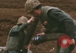 Image of Marines refueling UH-1E Iroquois helicopters Khe Sanh Vietnam, 1968, second 6 stock footage video 65675058028