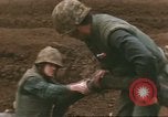 Image of Marines refueling UH-1E Iroquois helicopters Khe Sanh Vietnam, 1968, second 8 stock footage video 65675058028