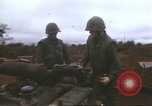 Image of Marines refueling UH-1E Iroquois helicopters Khe Sanh Vietnam, 1968, second 15 stock footage video 65675058028