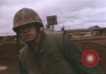 Image of Marines refueling UH-1E Iroquois helicopters Khe Sanh Vietnam, 1968, second 27 stock footage video 65675058028