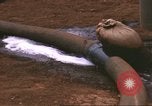 Image of Marines refueling UH-1E Iroquois helicopters Khe Sanh Vietnam, 1968, second 30 stock footage video 65675058028