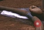Image of Marines refueling UH-1E Iroquois helicopters Khe Sanh Vietnam, 1968, second 31 stock footage video 65675058028