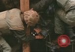 Image of Marines refueling UH-1E Iroquois helicopters Khe Sanh Vietnam, 1968, second 48 stock footage video 65675058028