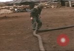Image of Marines refueling UH-1E Iroquois helicopters Khe Sanh Vietnam, 1968, second 59 stock footage video 65675058028