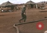 Image of Marines refueling UH-1E Iroquois helicopters Khe Sanh Vietnam, 1968, second 60 stock footage video 65675058028