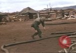 Image of Marines refueling UH-1E Iroquois helicopters Khe Sanh Vietnam, 1968, second 61 stock footage video 65675058028