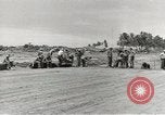 Standbild Erdbewegungsmaschinen Pacific Theater, 1944, aus Sekunde 49 historischem Filmmaterial Videoclip 65675058075