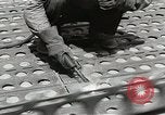 Standbild Erdbewegungsmaschinen Pacific Theater, 1944, aus Sekunde 57 historischem Filmmaterial Videoclip 65675058075