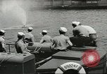 Standbild Bekämpfung von Bränden in den Seehäfen United States USA, 1944, aus Sekunde 48 historischem Filmmaterial Videoclip 65675058108