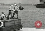 Standbild Bekämpfung von Bränden in den Seehäfen United States USA, 1944, aus Sekunde 56 historischem Filmmaterial Videoclip 65675058108