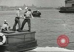 Standbild Bekämpfung von Bränden in den Seehäfen United States USA, 1944, aus Sekunde 57 historischem Filmmaterial Videoclip 65675058108