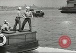 Standbild Bekämpfung von Bränden in den Seehäfen United States USA, 1944, aus Sekunde 58 historischem Filmmaterial Videoclip 65675058108