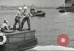 Standbild Bekämpfung von Bränden in den Seehäfen United States USA, 1944, aus Sekunde 59 historischem Filmmaterial Videoclip 65675058108