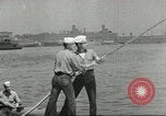 Standbild Bekämpfung von Bränden in den Seehäfen United States USA, 1944, aus Sekunde 61 historischem Filmmaterial Videoclip 65675058108