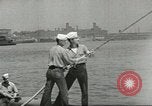 Standbild Bekämpfung von Bränden in den Seehäfen United States USA, 1944, aus Sekunde 62 historischem Filmmaterial Videoclip 65675058108