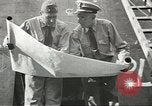 Image of Officers of U.S.Coast Guard Marine Inspection Division at work United States USA, 1944, second 19 stock footage video 65675058111