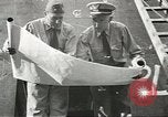 Image of Officers of U.S.Coast Guard Marine Inspection Division at work United States USA, 1944, second 20 stock footage video 65675058111