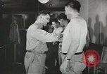 Image of Coast Guard screens prospective Merchant Marine seamen United States USA, 1944, second 13 stock footage video 65675058114