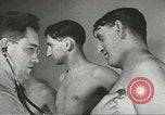 Image of Coast Guard screens prospective Merchant Marine seamen United States USA, 1944, second 16 stock footage video 65675058114