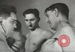 Image of Coast Guard screens prospective Merchant Marine seamen United States USA, 1944, second 17 stock footage video 65675058114