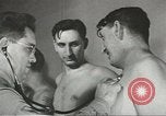 Image of Coast Guard screens prospective Merchant Marine seamen United States USA, 1944, second 18 stock footage video 65675058114