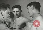 Image of Coast Guard screens prospective Merchant Marine seamen United States USA, 1944, second 19 stock footage video 65675058114