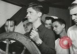 Image of Coast Guard screens prospective Merchant Marine seamen United States USA, 1944, second 43 stock footage video 65675058114