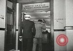 Image of Coast Guard screens prospective Merchant Marine seamen United States USA, 1944, second 56 stock footage video 65675058114