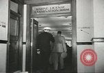 Image of Coast Guard screens prospective Merchant Marine seamen United States USA, 1944, second 57 stock footage video 65675058114