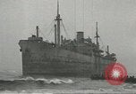 Image of Coast Guard rescues seamen from beached freighter United States USA, 1944, second 3 stock footage video 65675058118