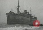 Image of Coast Guard rescues seamen from beached freighter United States USA, 1944, second 5 stock footage video 65675058118