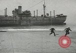 Image of Coast Guard rescues seamen from beached freighter United States USA, 1944, second 8 stock footage video 65675058118
