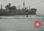 Image of Coast Guard rescues seamen from beached freighter United States USA, 1944, second 12 stock footage video 65675058118