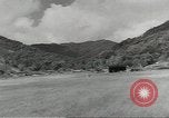 Standbild Douglas C-47 Skytrain Wau Papua Neu Guinea, 1943, aus Sekunde 59 historischem Filmmaterial Videoclip 65675058121