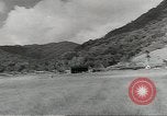 Standbild Douglas C-47 Skytrain Wau Papua Neu Guinea, 1943, aus Sekunde 60 historischem Filmmaterial Videoclip 65675058121