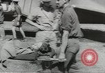 Standbild Douglas C-47 Skytrain Wau Papua Neu Guinea, 1943, aus Sekunde 15 historischem Filmmaterial Videoclip 65675058123