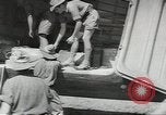 Standbild Douglas C-47 Skytrain Wau Papua Neu Guinea, 1943, aus Sekunde 22 historischem Filmmaterial Videoclip 65675058123