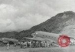 Standbild Douglas C-47 Skytrain Wau Papua Neu Guinea, 1943, aus Sekunde 27 historischem Filmmaterial Videoclip 65675058123