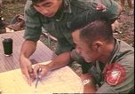 Image of Vietnamese officer Vietnam, 1970, second 9 stock footage video 65675058214