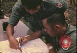 Image of Vietnamese officer Vietnam, 1970, second 11 stock footage video 65675058214