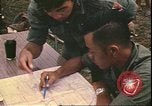 Image of Vietnamese officer Vietnam, 1970, second 12 stock footage video 65675058214