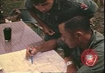 Image of Vietnamese officer Vietnam, 1970, second 13 stock footage video 65675058214