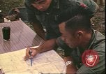 Image of Vietnamese officer Vietnam, 1970, second 14 stock footage video 65675058214