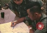 Image of Vietnamese officer Vietnam, 1970, second 17 stock footage video 65675058214