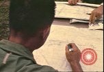 Image of Vietnamese officer Vietnam, 1970, second 30 stock footage video 65675058214