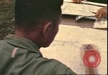 Image of Vietnamese officer Vietnam, 1970, second 31 stock footage video 65675058214