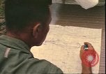 Image of Vietnamese officer Vietnam, 1970, second 32 stock footage video 65675058214